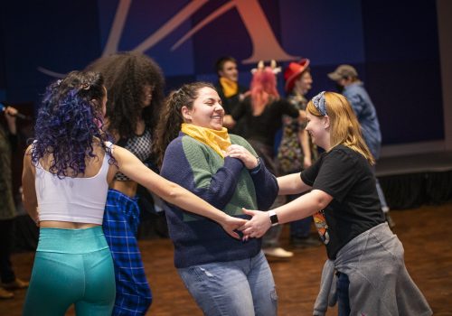 Students dancing at an event