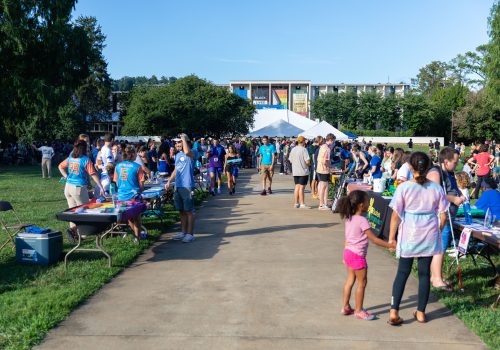 students at an event on the quad