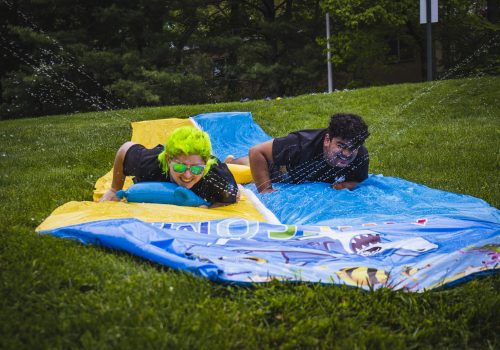 two people on a water slide